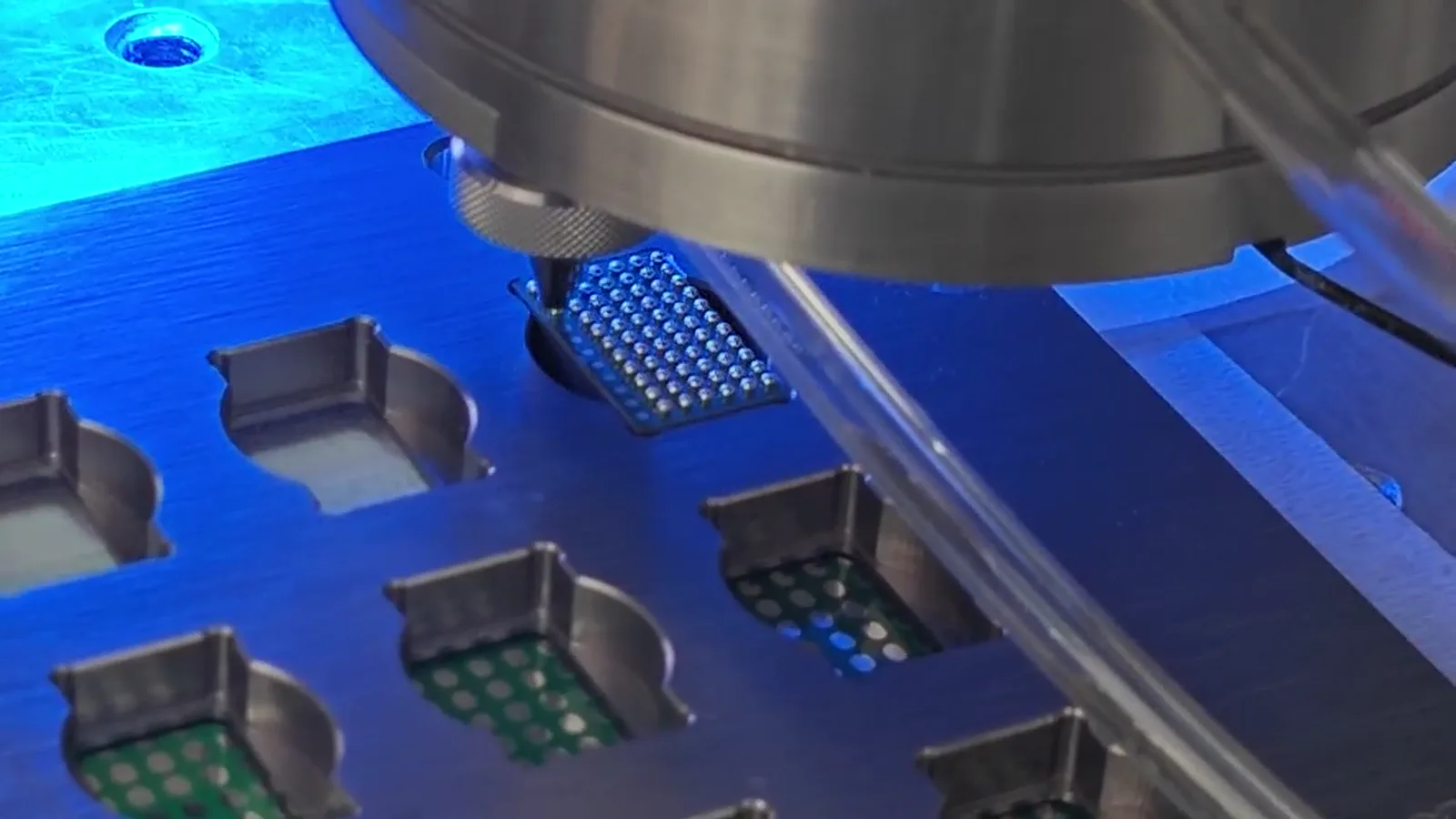 Supplied process frame showing fixture-supported test positions during solder ball jetting